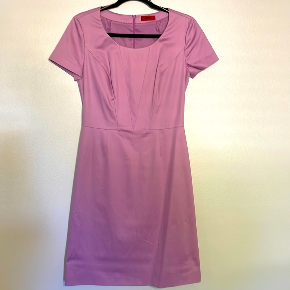 Light fuchsia, fitted and lined. Never been worn. Perfect condition.